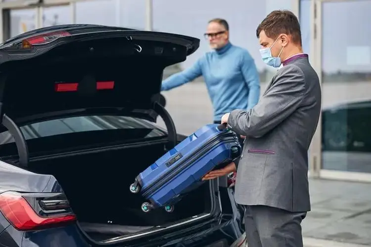 Zurich airport transfer meet and greet with a private chauffeur holding a name sign